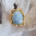 anello con pietra di acquamarina cabochon ovale naturale